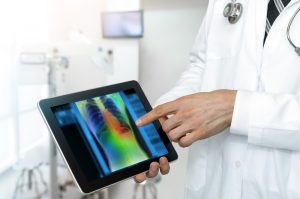 doctor holding tablet AI biomedical algorithm